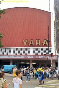 Ah, the famous Cinema Yara, located at the corner of L and 23 street, in Vedado. It's one of the largest cinemas in the city, and it's air conditioned, so you can imagine that it's really popular, especially when it's hot outside. The price to see most movies is only 2 pesos (Moneda Nacional). In front of the Cinema Yara is also a popular meeting place for friends to gather and plan their evening. It's at the corner of some major bus and taxi routes, so, generally, if you are planning to meet somebody in Vedado, it very common just to meet them in front of the Yara.