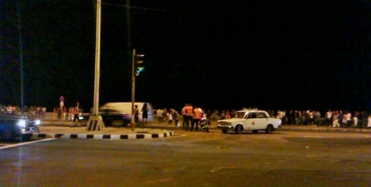 crowds on the havana malecon vedado